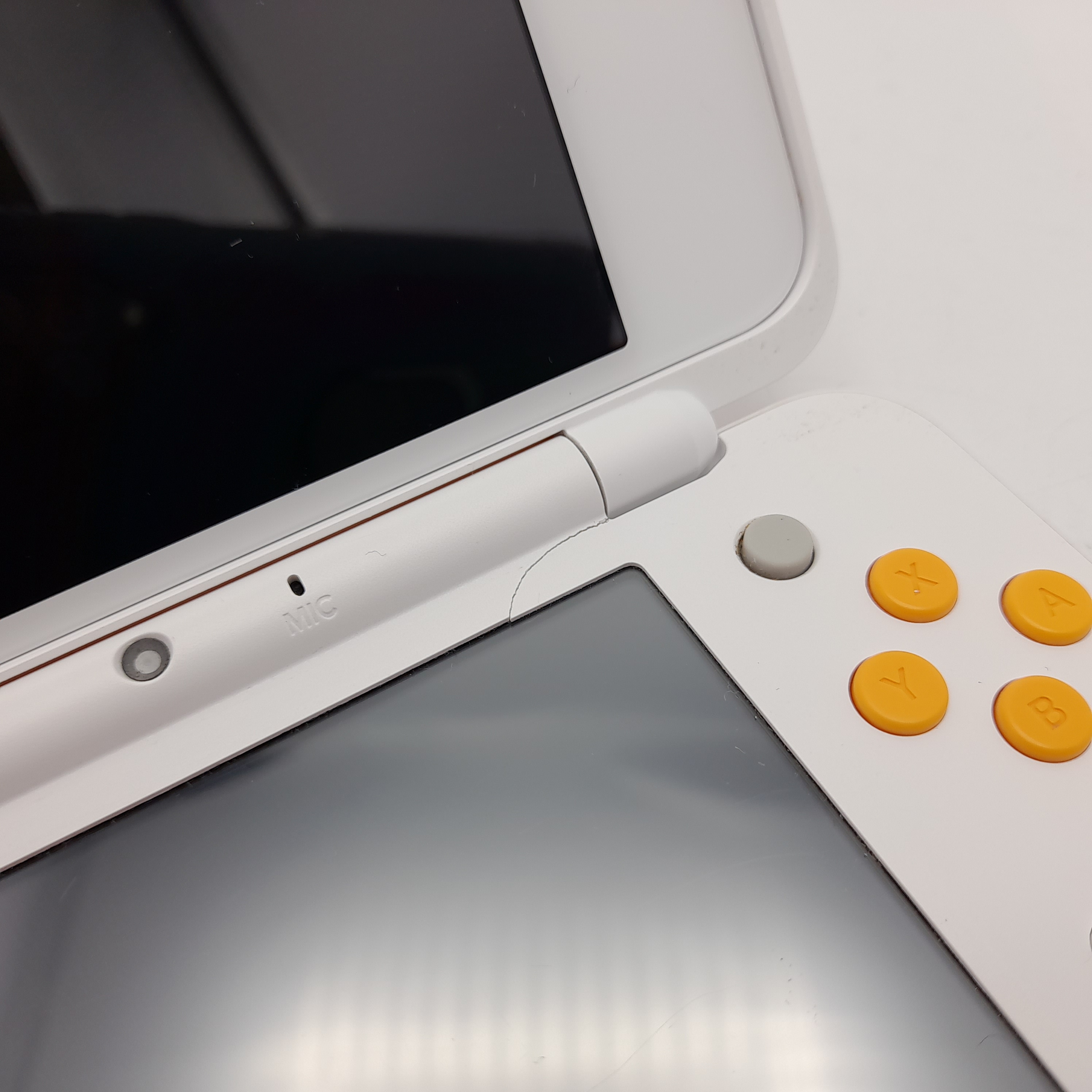 Foto van New Nintendo 2DS XL Wit Oranje - Nette Staat